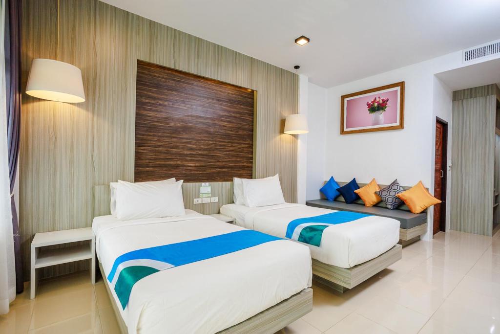 Postel nebo postele na pokoji v ubytování Ao Nang Baan Suan Resort