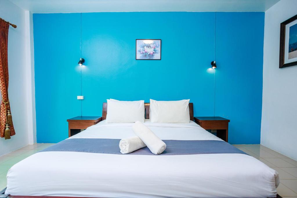 Postel nebo postele na pokoji v ubytování Ao Nang Baan Suan Resort