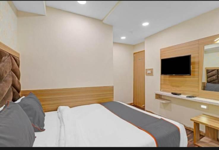 Postel nebo postele na pokoji v ubytování HOTEL STAY INN
