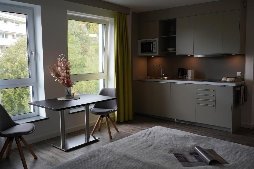 Kuchyň nebo kuchyňský kout v ubytování Gandersheimer Boardinghouse