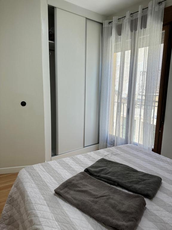 A bed or beds in a room at Apartamento Nuevo Duplex