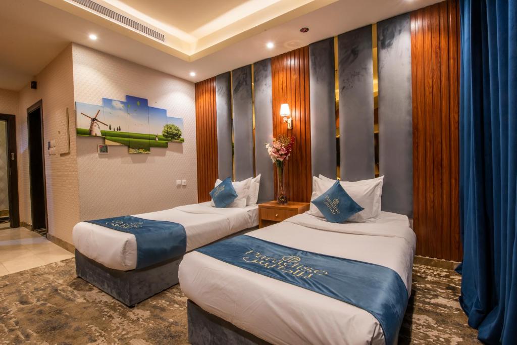 Postel nebo postele na pokoji v ubytování Paradise Inn Jeddah Hotel