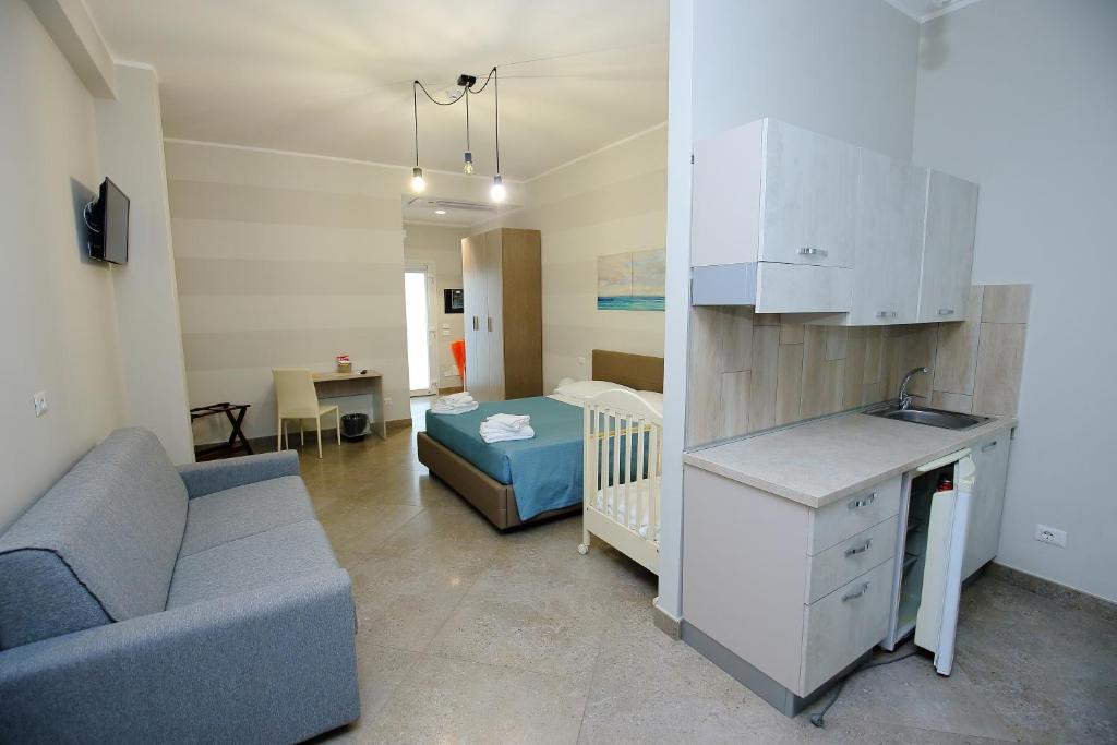Kuchyň nebo kuchyňský kout v ubytování Sand Hotel
