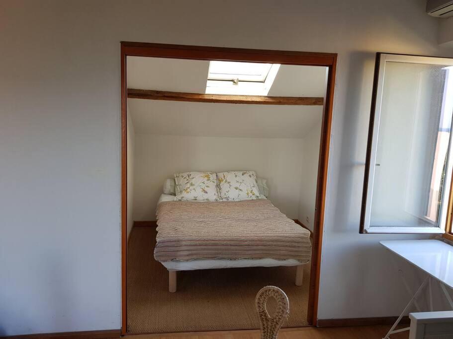 Postel nebo postele na pokoji v ubytování Appartement près des plages du Mourillon