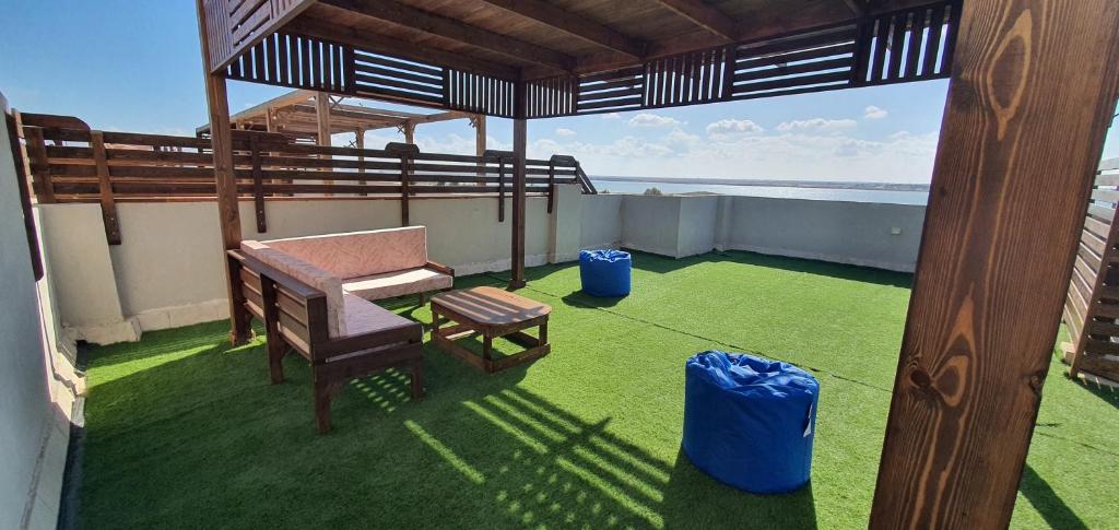 Balcone o terrazza di جراند هيلز الساحل الشمالي Grand Hills North Coast شالية فندقي H047 عائلات فقط