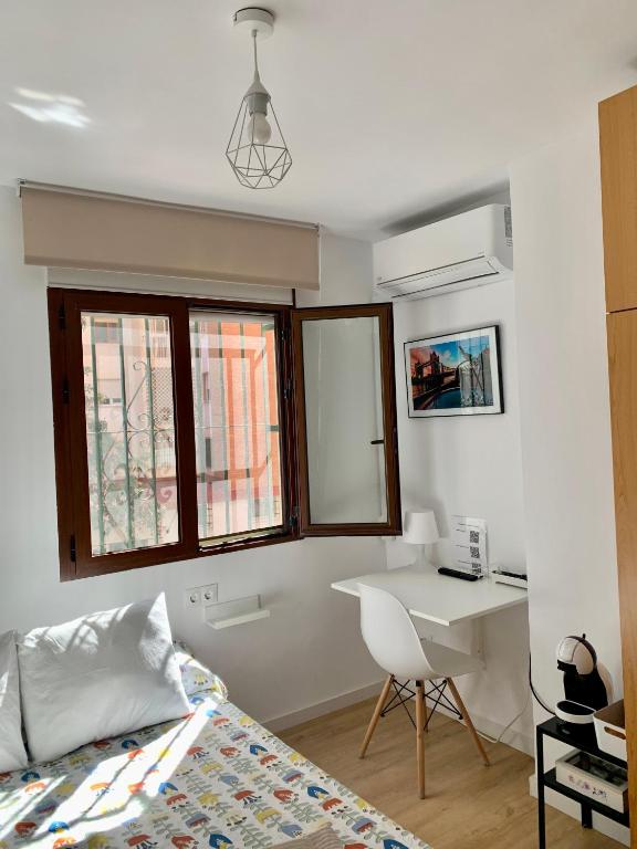Posteľ alebo postele v izbe v ubytovaní Habitación González