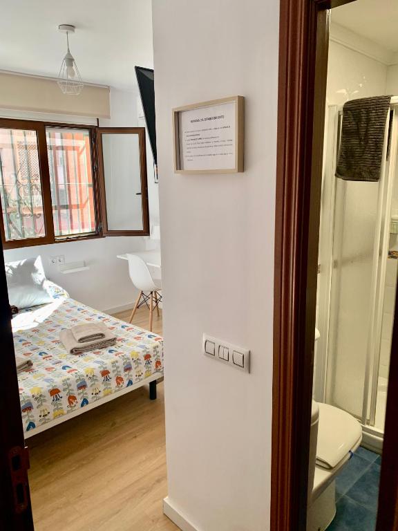Posteľ alebo postele v izbe v ubytovaní Habitación González
