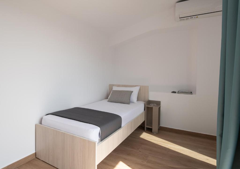 Postel nebo postele na pokoji v ubytování Diva Lodge