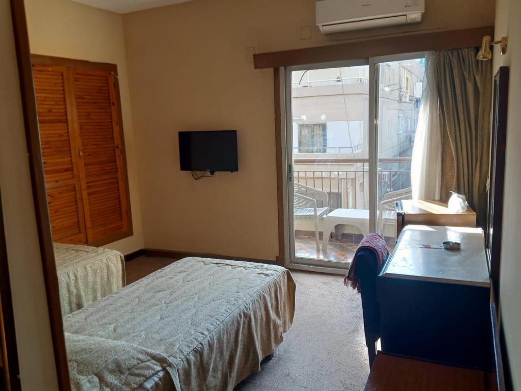 Postel nebo postele na pokoji v ubytování St.George