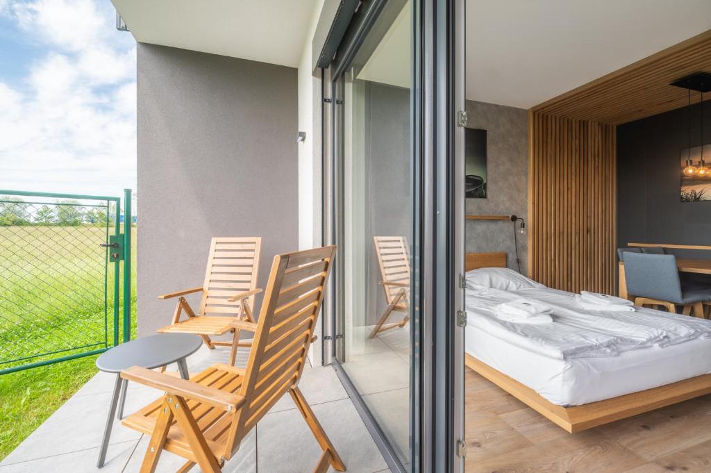 Łóżko lub łóżka w pokoju w obiekcie RELAX PARK Třeboň II