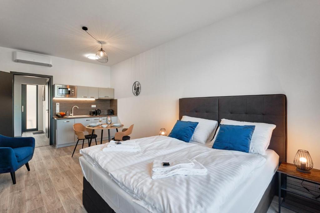 Łóżko lub łóżka w pokoju w obiekcie RELAX PARK Třeboň II