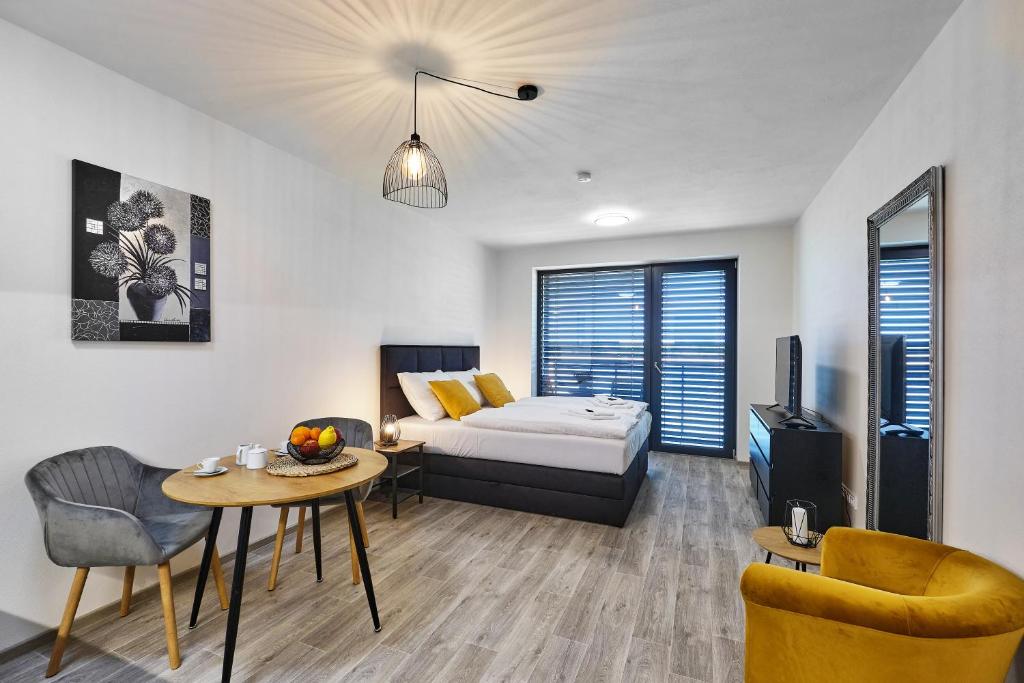 Łóżko lub łóżka w pokoju w obiekcie RELAX PARK Třeboň II
