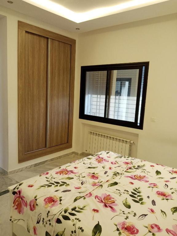 Postel nebo postele na pokoji v ubytování DarNejib, ElWafa city - north Hammamet