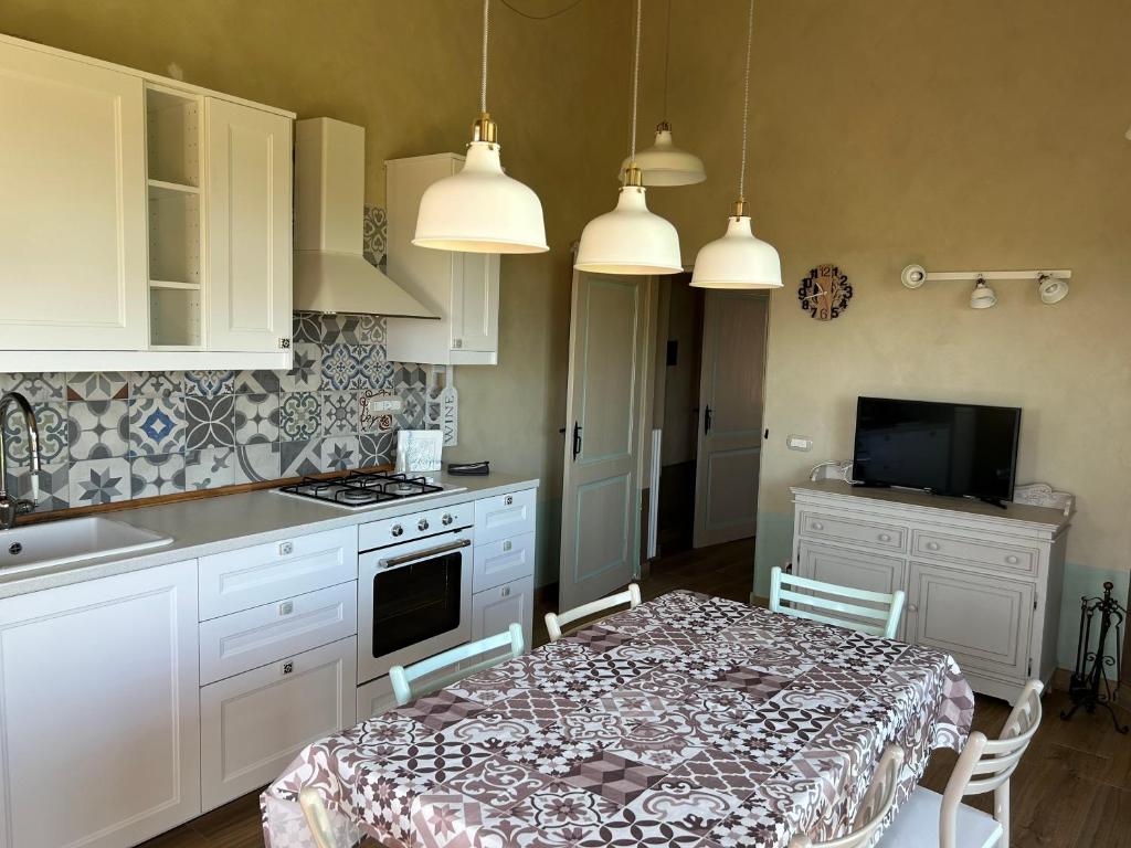 Kuchyň nebo kuchyňský kout v ubytování Casa Nonna Ada