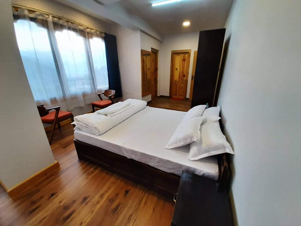 Postel nebo postele na pokoji v ubytování Ma-Chhim Furnished Apartment