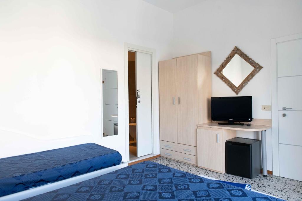 Postel nebo postele na pokoji v ubytování Hotel Smart Cervia B&B