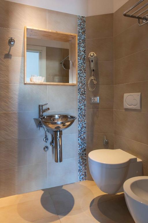 Koupelna v ubytování Hotel Smart Cervia B&B