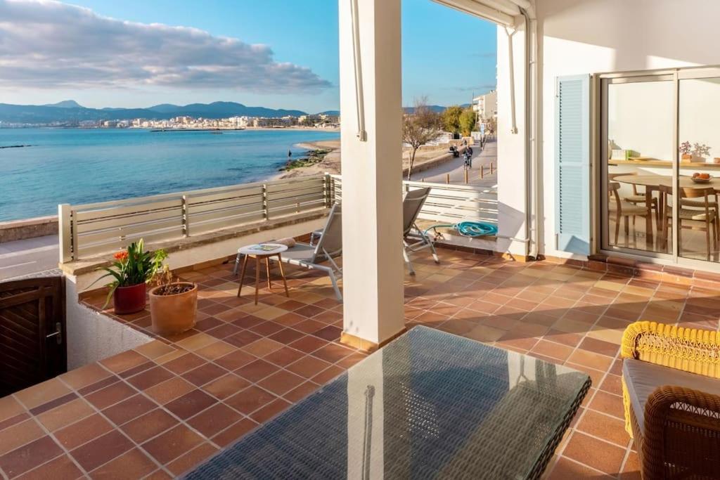 a balcony with a view of the water at Las Rocas Beach-Ciutat Jardi Playa in Palma de Mallorca