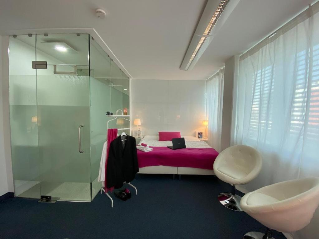 Postel nebo postele na pokoji v ubytování Business Hotel Wiesbaden PRIME