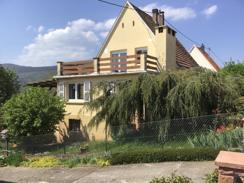 a house with a fence in front of it at Maison individuelle dans les Vosges du nord in Niederbronn-les-Bains