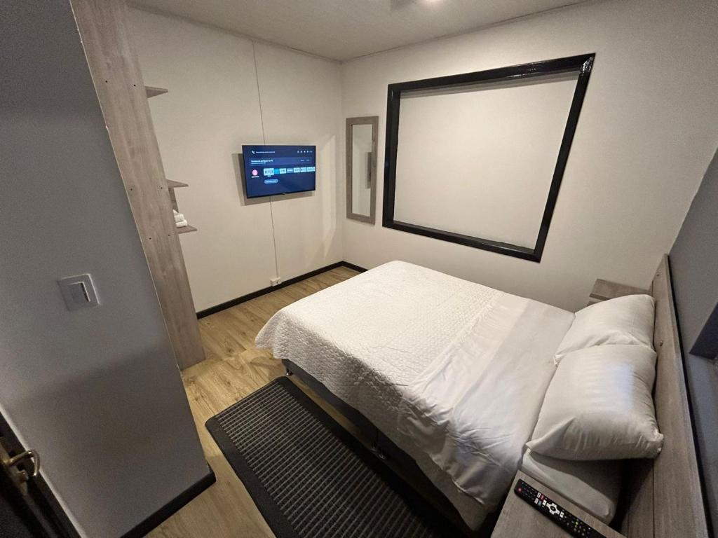 Postel nebo postele na pokoji v ubytování Hostel Quinta Camacho
