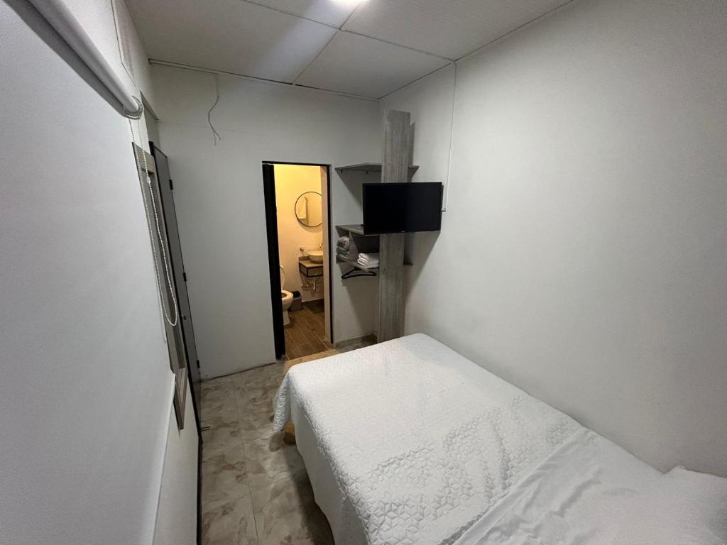 Postel nebo postele na pokoji v ubytování Hostel Quinta Camacho