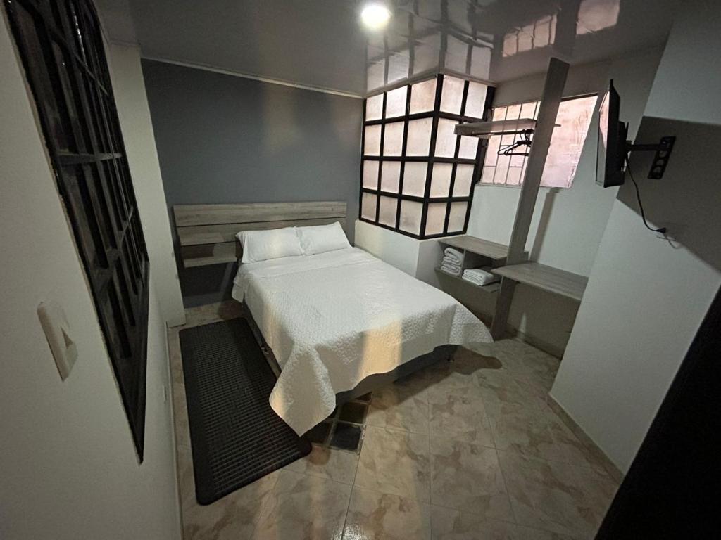 Postel nebo postele na pokoji v ubytování Hostel Quinta Camacho