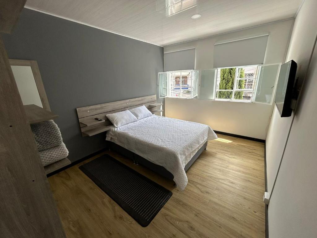 Postel nebo postele na pokoji v ubytování Hostel Quinta Camacho