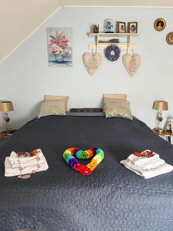 Postel nebo postele na pokoji v ubytování B&B t'Brocantje
