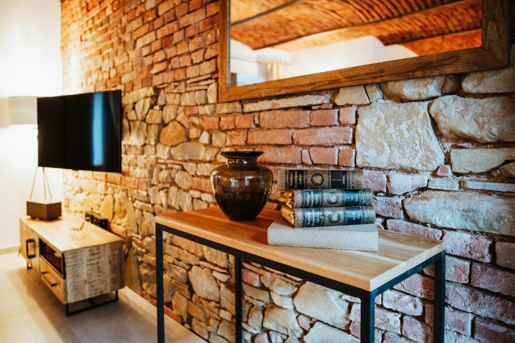 TV a/nebo společenská místnost v ubytování Galerie mlýn Žeraviny
