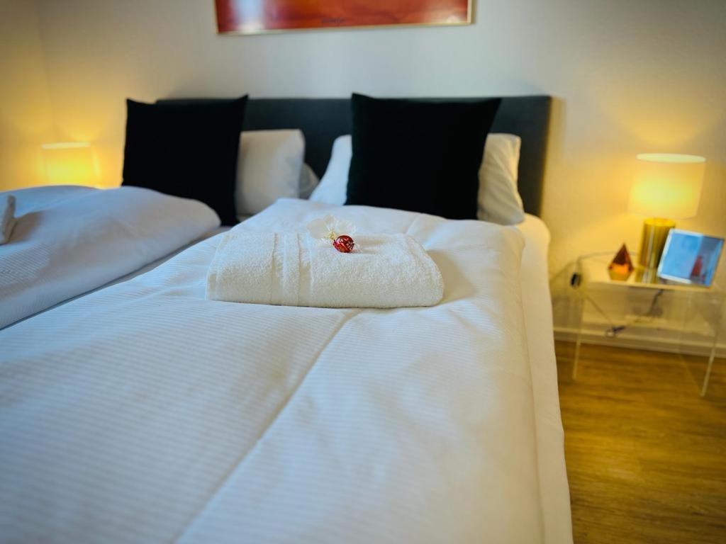 Postel nebo postele na pokoji v ubytování Casa Bella Metzingen