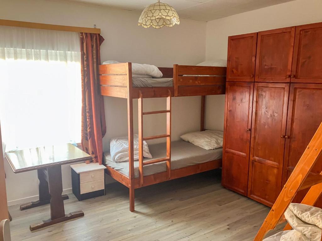 Postel nebo postele na pokoji v ubytování Gasthof Alpenrose