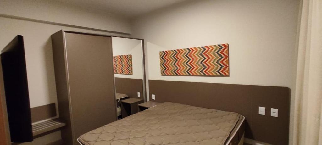 Giường trong phòng chung tại Hotel Park Veredas - Rio Quente Flat 225