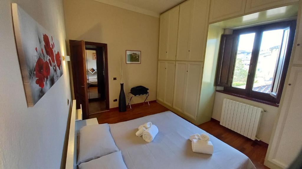 Postel nebo postele na pokoji v ubytování Borgo 134