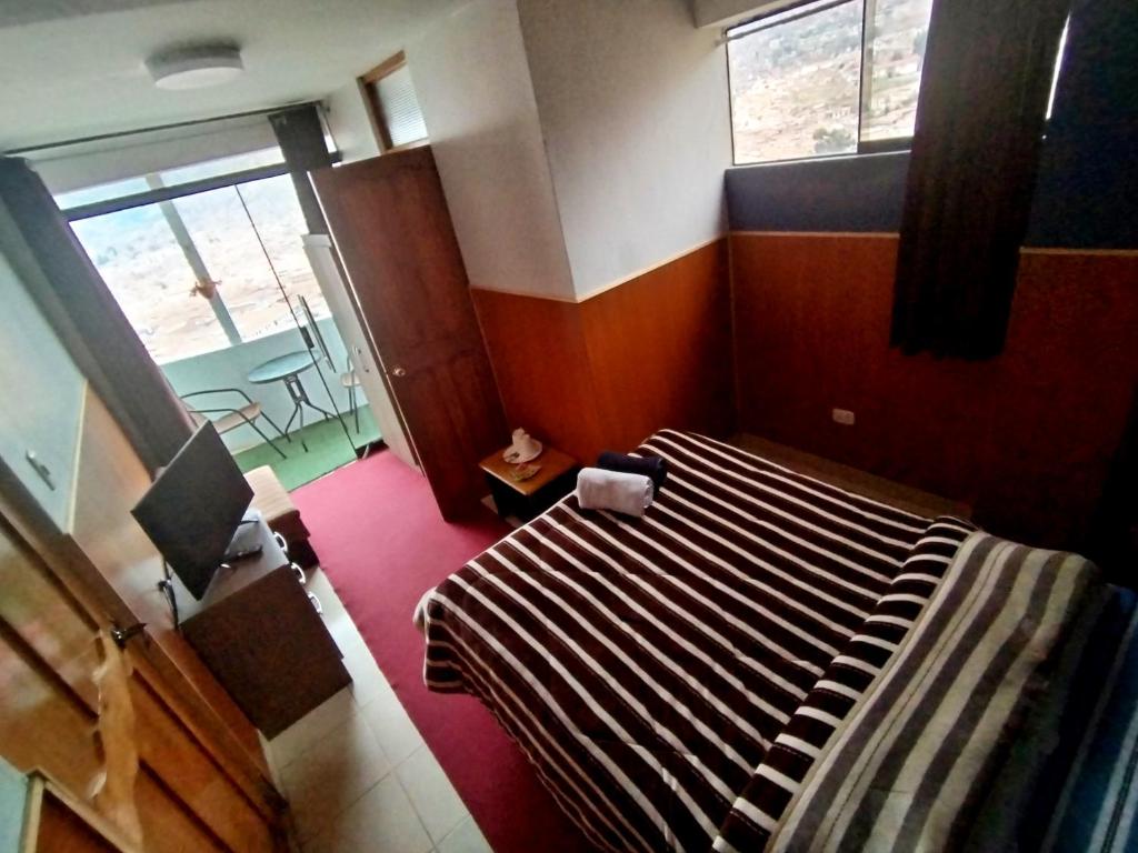 Postel nebo postele na pokoji v ubytování Casa Mirador guesthouse