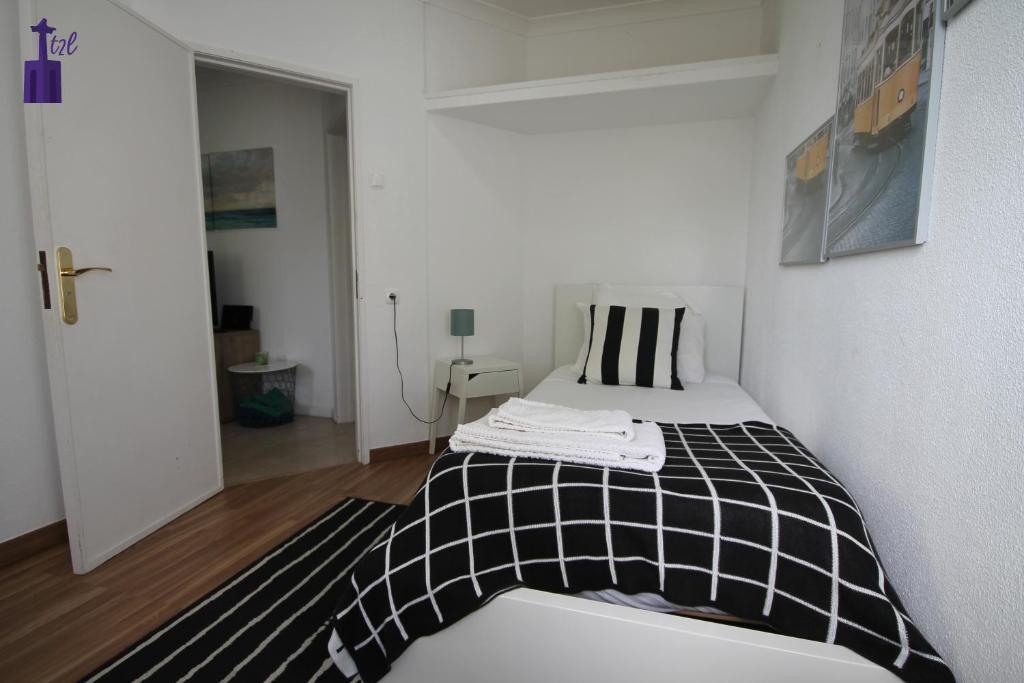 Lisbon South Apartmentにあるベッド