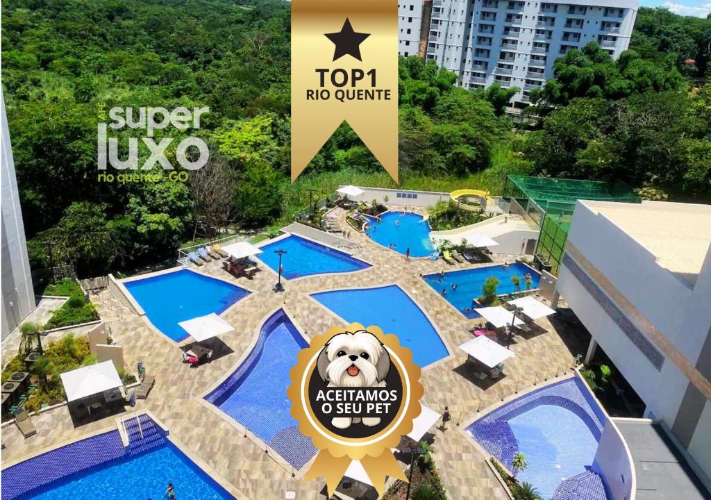 a view of a pool at a resort at Flat Super Luxo - Rio Quente - Acesso Ao Rio in Rio Quente