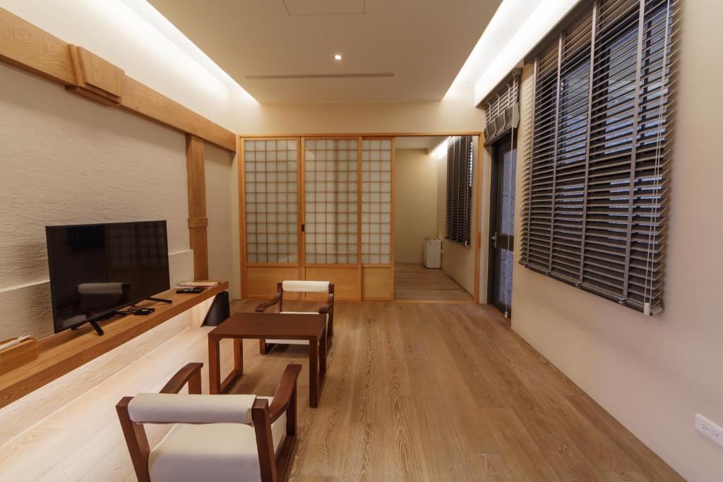 TV a/nebo společenská místnost v ubytování 金漫會館-金瓜石九份景觀民宿-Jien Mount Villas