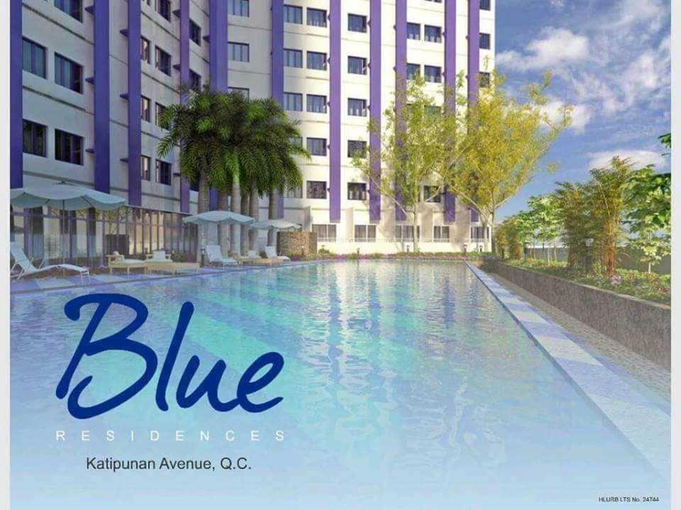 a large swimming pool with buildings in the background at Jimi's Place in SMDC Katipunan Blue Residence in Manila