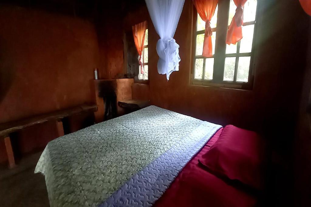 Postel nebo postele na pokoji v ubytování Doi PuMuen LAHU Homestay
