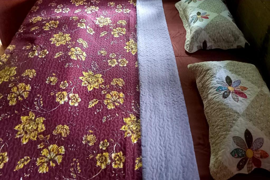 Postel nebo postele na pokoji v ubytování Doi PuMuen LAHU Homestay