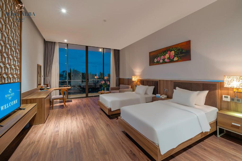 Postel nebo postele na pokoji v ubytování Rosa Alba Resort & Villas Tuy Hoa