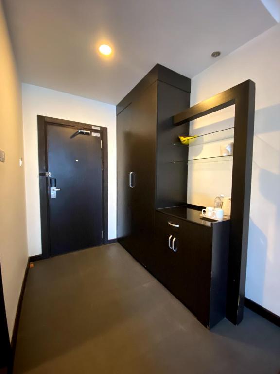 Postel nebo postele na pokoji v ubytování H-5 INN