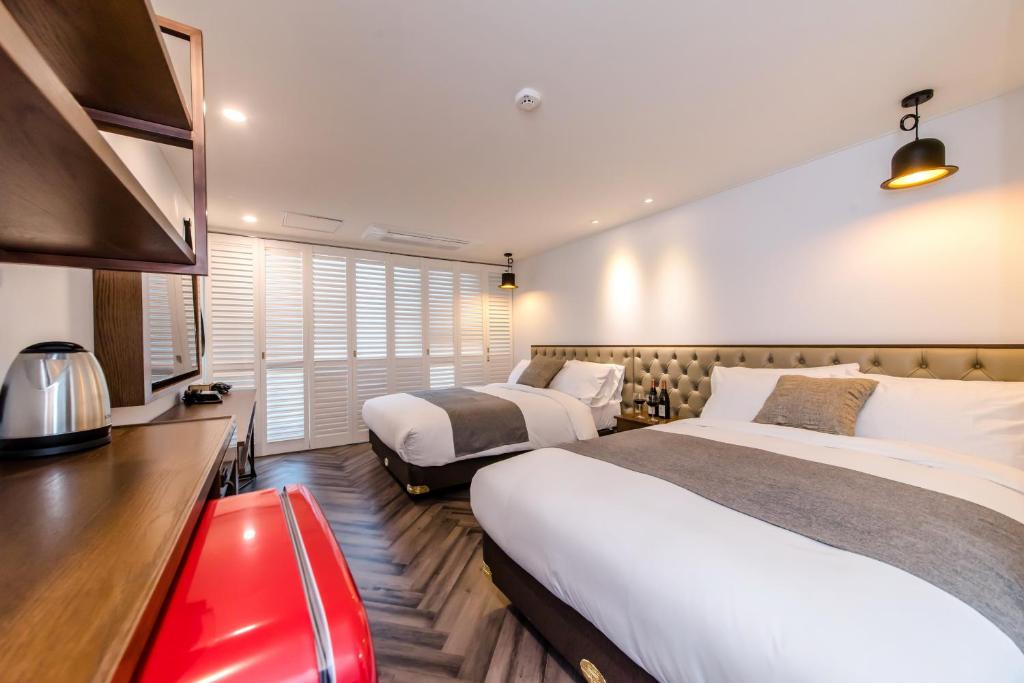 Postel nebo postele na pokoji v ubytování Marevo Beach Hotel