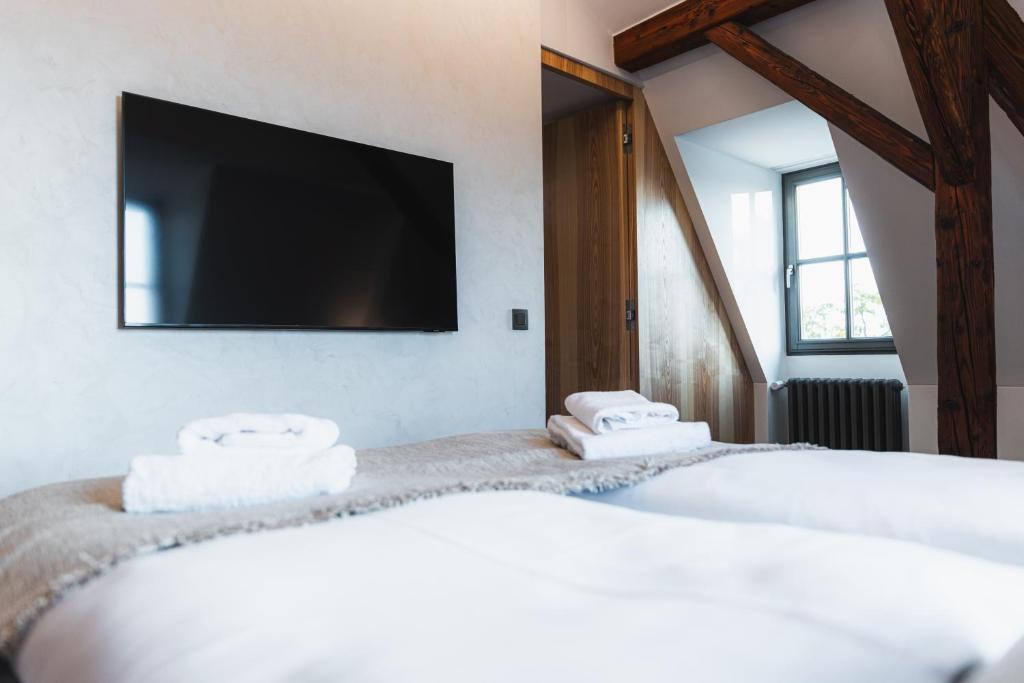 Postel nebo postele na pokoji v ubytování Hotel ALBRECHT