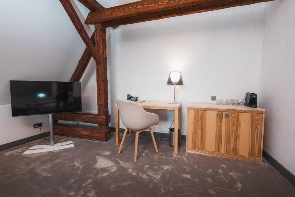 TV a/nebo společenská místnost v ubytování Hotel ALBRECHT