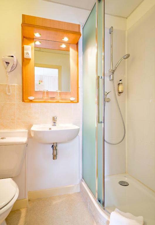 Koupelna v ubytování Hôtel Continental