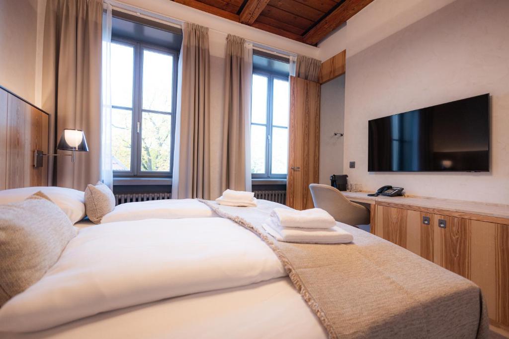 Postel nebo postele na pokoji v ubytování Hotel ALBRECHT