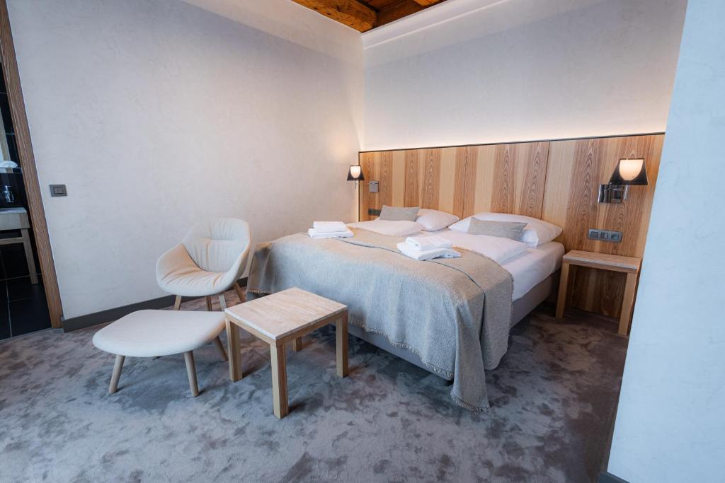 Postel nebo postele na pokoji v ubytování Hotel ALBRECHT