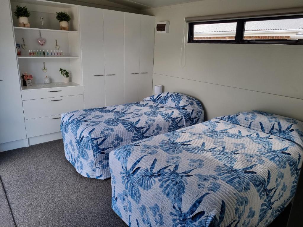 Postel nebo postele na pokoji v ubytování PWL Healing Retreat Accommodation